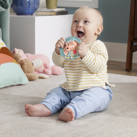 Imagine Fisher Price Jucărie Zornăitoare Salamandra – o rotire veselă, o mângâiere blândă și o joacă de neuitat!