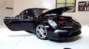 Imagine MASINUTA METALICA PORSCHE 911 NEGRU SCARA 1 LA 24