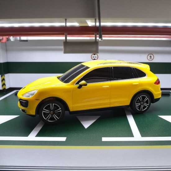 Imagine MASINA CU TELECOMANDA PORSCHE CAYENNE TURBO GALBEN CU SCARA 1 LA 24