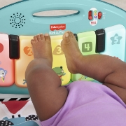 Imagine FISHER PRICE SALTELUTA DE JOACA PIAN MUZICAL IN LIMBA GREACA