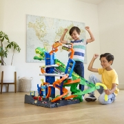 Imagine HOT WHEELS CITY SET DE JOACA GARAJ T REX SUPREM CU 2 MASINUTE INCLUSE 