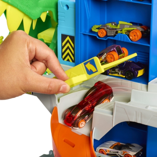 Imagine HOT WHEELS CITY SET DE JOACA GARAJ T REX SUPREM CU 2 MASINUTE INCLUSE 