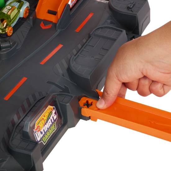 Imagine HOT WHEELS CITY SET DE JOACA GARAJ T REX SUPREM CU 2 MASINUTE INCLUSE 